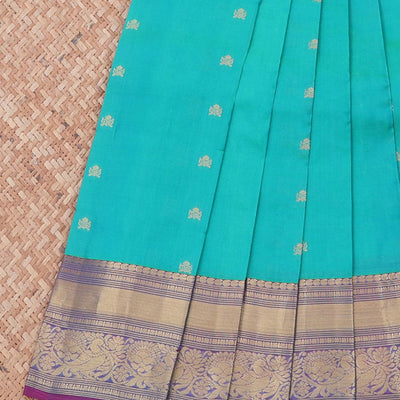 Blue vasundhara silk mix saree with buttas, contrast jaal pallu & traditional design zari border