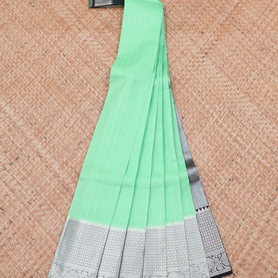 Green vasundhara silk mix saree with zari designs, contrast jaal pallu & traditional design zari border