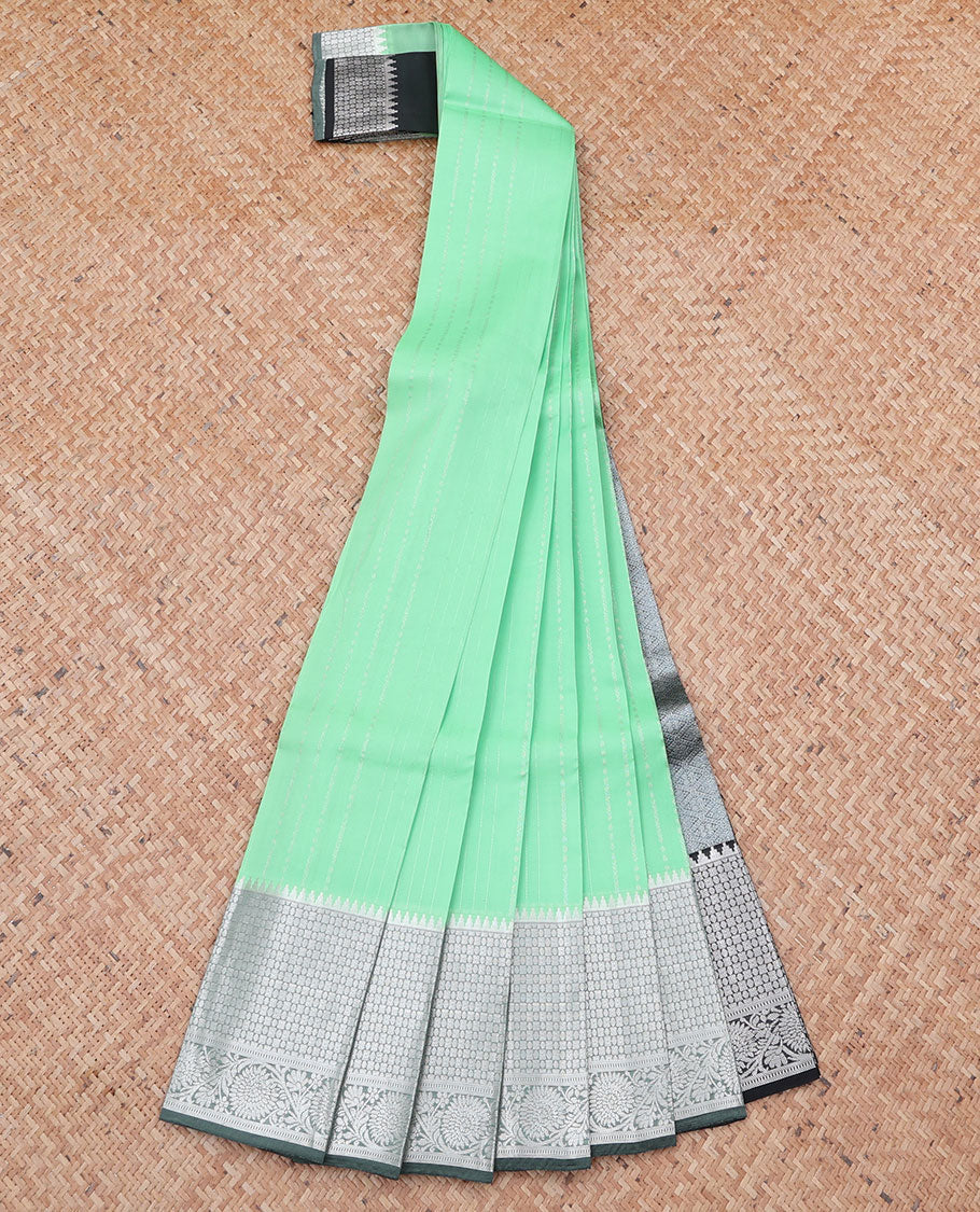 Green vasundhara silk mix saree with zari designs, contrast jaal pallu & traditional design zari border
