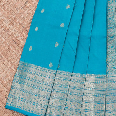 Blue vasundhara silk mix saree with zari buttas, intricate pallu & traditional design border