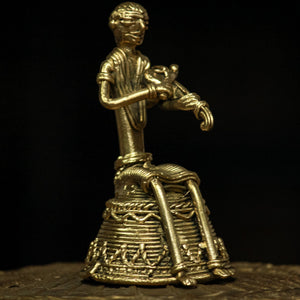 Dhokra - Tribal Musician sitting on base playing Kendra (1 PICES)