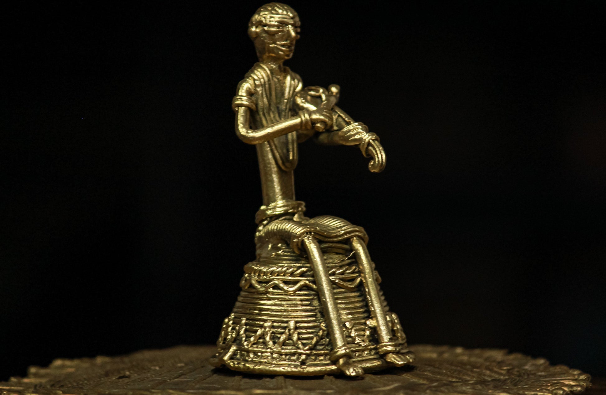 Dhokra - Tribal Musician sitting on base playing Kendra (1 PICES)