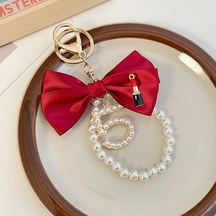 Graceful Pearl String Bow Keychain