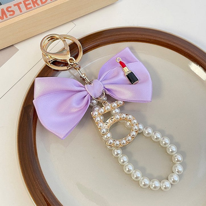 Graceful Pearl String Bow Keychain