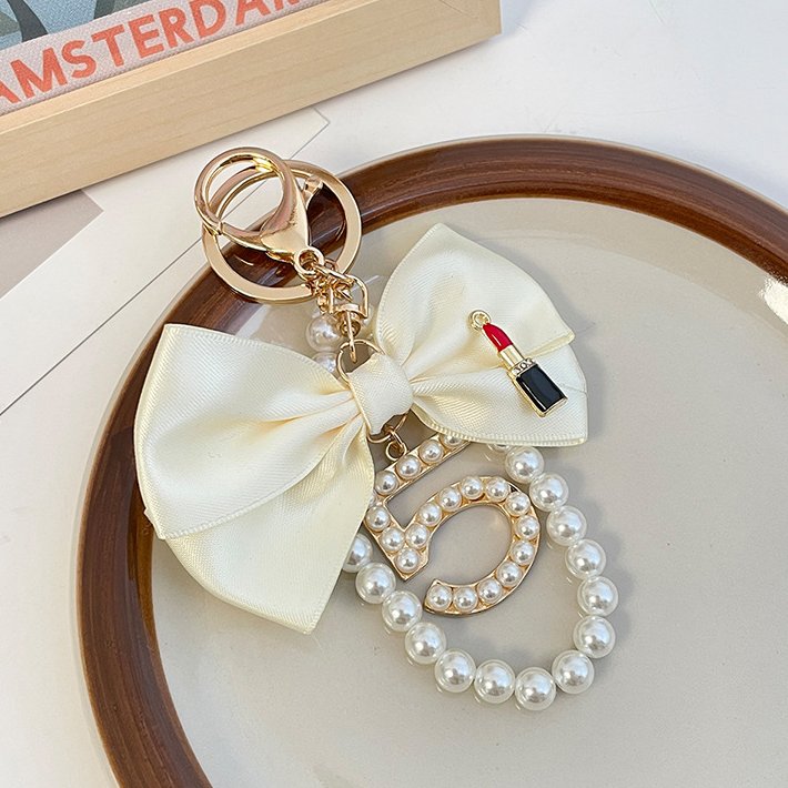 Graceful Pearl String Bow Keychain