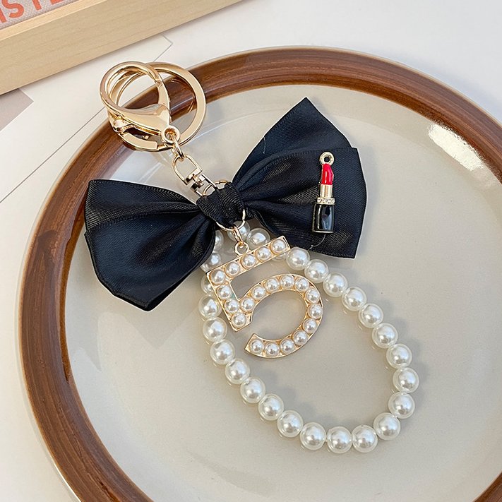 Graceful Pearl String Bow Keychain