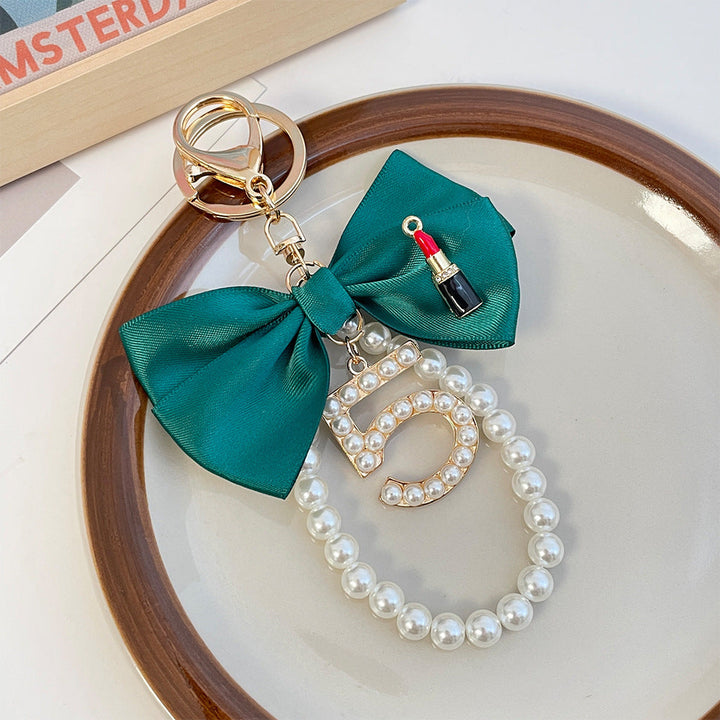 Graceful Pearl String Bow Keychain