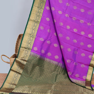 Purple zari buttas silksaree, contrast jaal pallu & border of thilakam,neli,kathir,kodi visiry & mayil kann