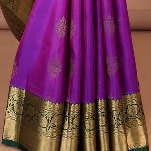 Purple zari buttas silksaree, contrast jaal pallu & border of thilakam,neli,kathir,kodi visiry & mayil kann