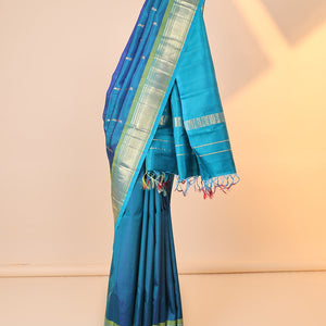 Blue buttas kancheepuram silksaree, zari design pallu & contrast border of panner sombu,banaras,muthu,mayil kann
