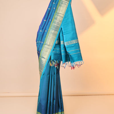 Blue buttas kancheepuram silksaree, zari design pallu & contrast border of panner sombu,banaras,muthu,mayil kann