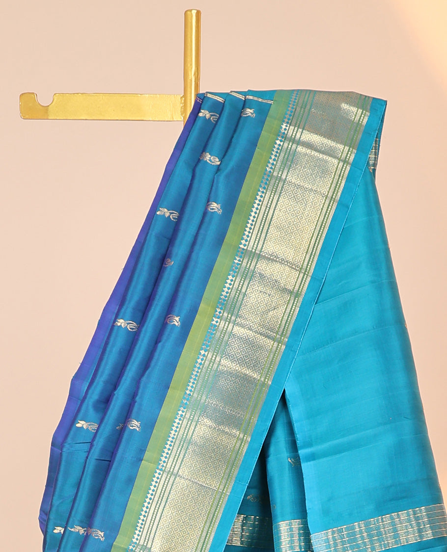 Blue buttas kancheepuram silksaree, zari design pallu & contrast border of panner sombu,banaras,muthu,mayil kann
