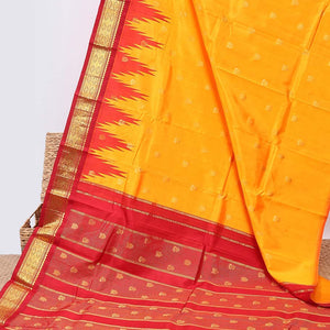 Yellow buttas kancheepuram silksaree, contrast vidarbha one-side border of salngai,neli & jaal & zari striped pallu