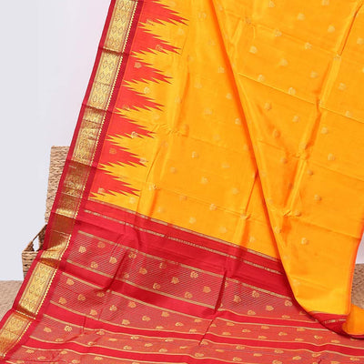 Yellow buttas kancheepuram silksaree, contrast vidarbha one-side border of salngai,neli & jaal & zari striped pallu