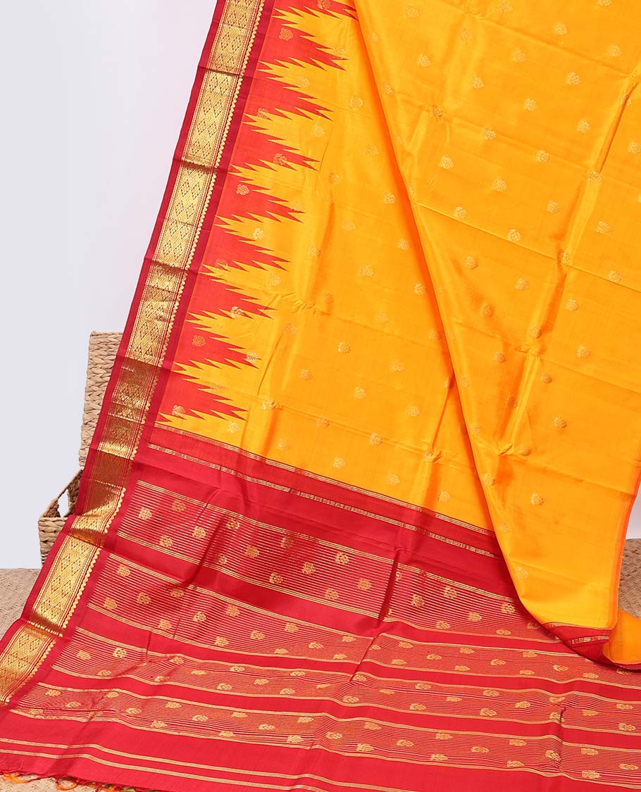 Yellow buttas kancheepuram silksaree, contrast vidarbha one-side border of salngai,neli & jaal & zari striped pallu