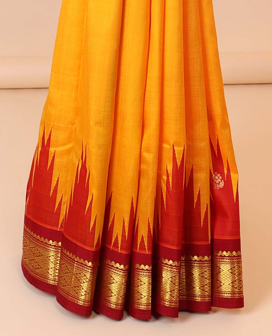 Yellow buttas kancheepuram silksaree, contrast vidarbha one-side border of salngai,neli & jaal & zari striped pallu