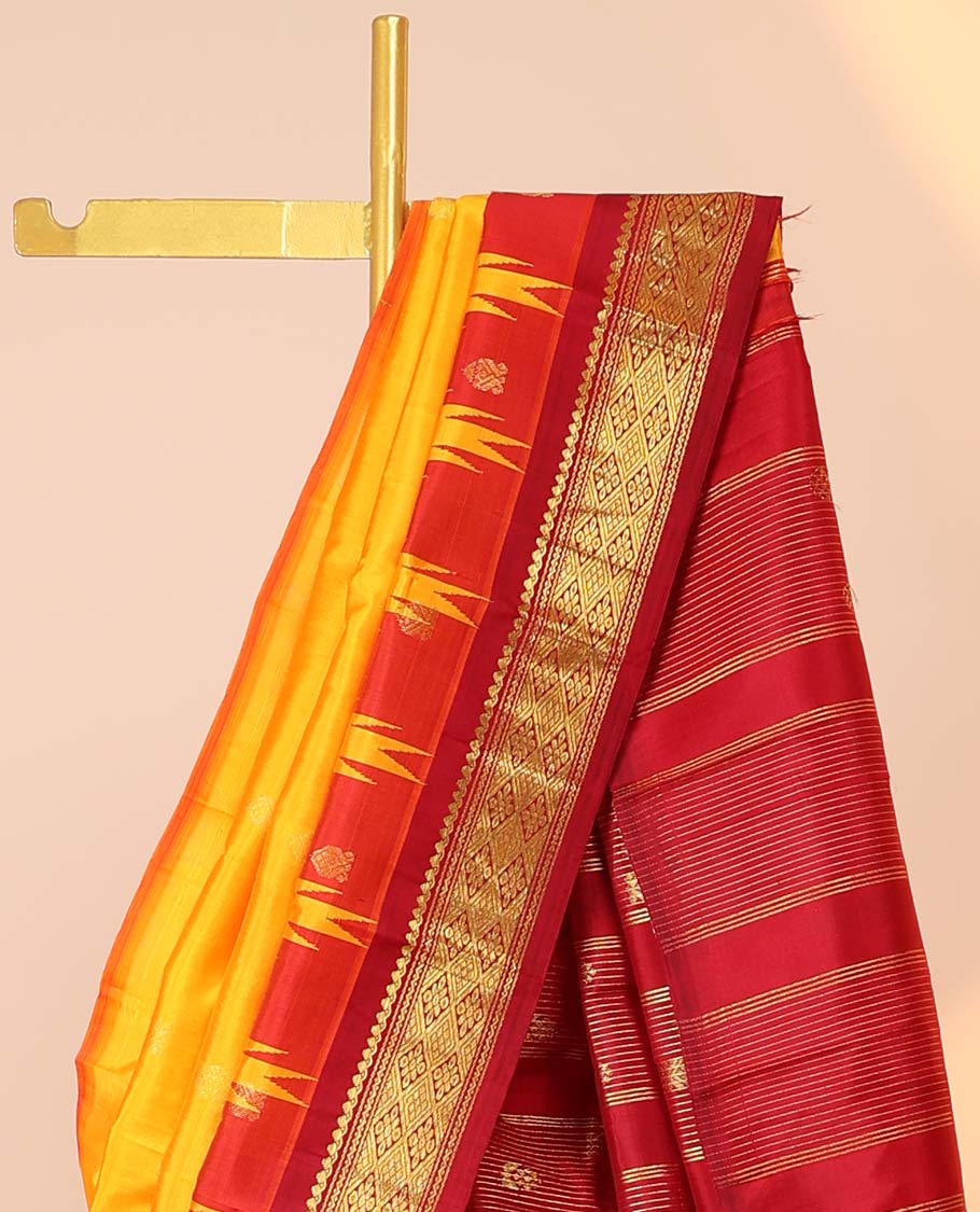Yellow buttas kancheepuram silksaree, contrast vidarbha one-side border of salngai,neli & jaal & zari striped pallu