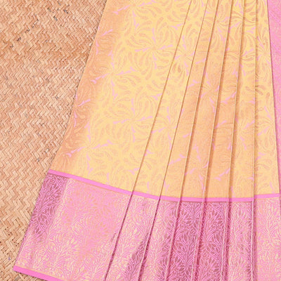 Yellow jacquard wedding silksaree, contrast diagonal striped pallu & zari border of floral jaal designs