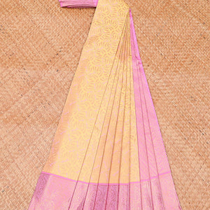 Yellow jacquard wedding silksaree, contrast diagonal striped pallu & zari border of floral jaal designs