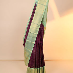 Purple zari designs kanchipuram silksaree,contrast intricate pallu & korvai border of rekku,neli,mayil,poun & kuyil kann