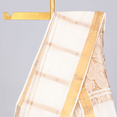 Cream kerala saree with zari designs, zari border & pallu of paisley designs in zari