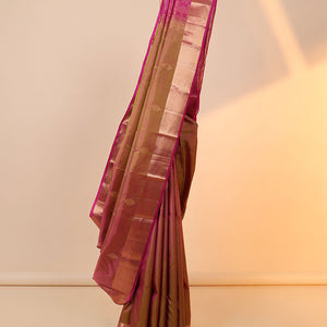 Green dual-tone silk saree with zari buttas, vanki border & contrast pallu of intricate designs in zari
