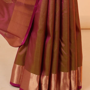 Green dual-tone silk saree with zari buttas, vanki border & contrast pallu of intricate designs in zari