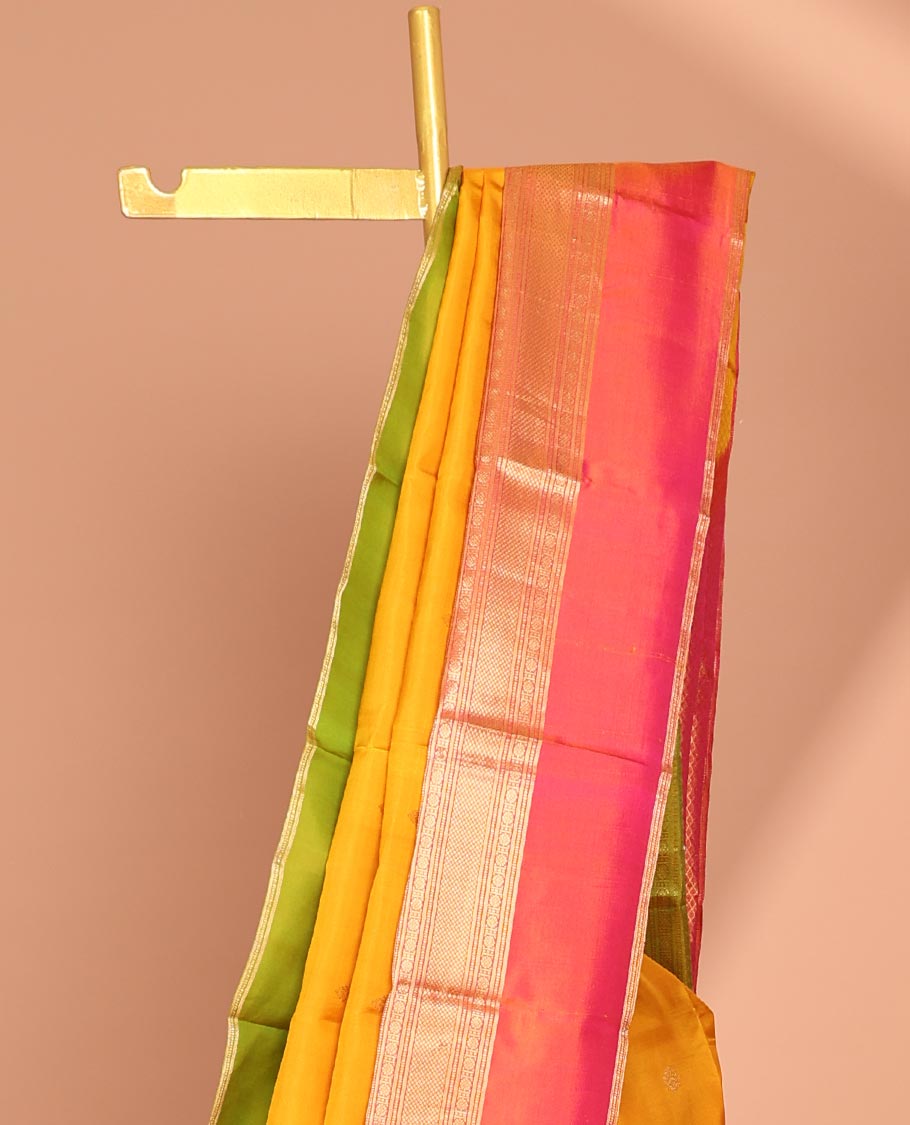 Yellow zari buttas silk saree, contrast ganga jamuna border of muthu, poun & kuyil kann &  pallu of intricate designs