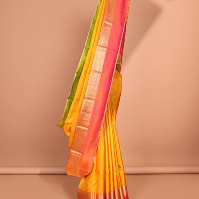 Yellow zari buttas silk saree, contrast ganga jamuna border of muthu, poun & kuyil kann &  pallu of intricate designs