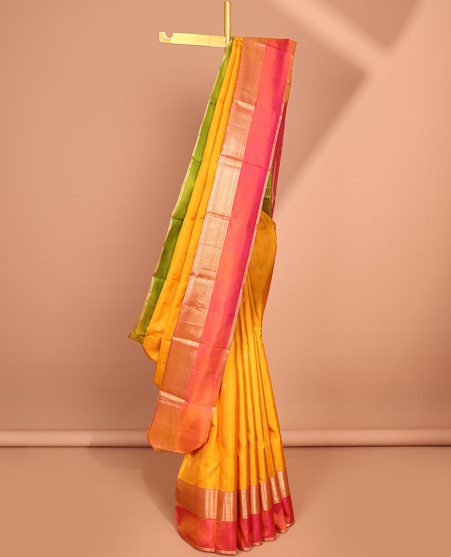 Yellow zari buttas silk saree, contrast ganga jamuna border of muthu, poun & kuyil kann &  pallu of intricate designs