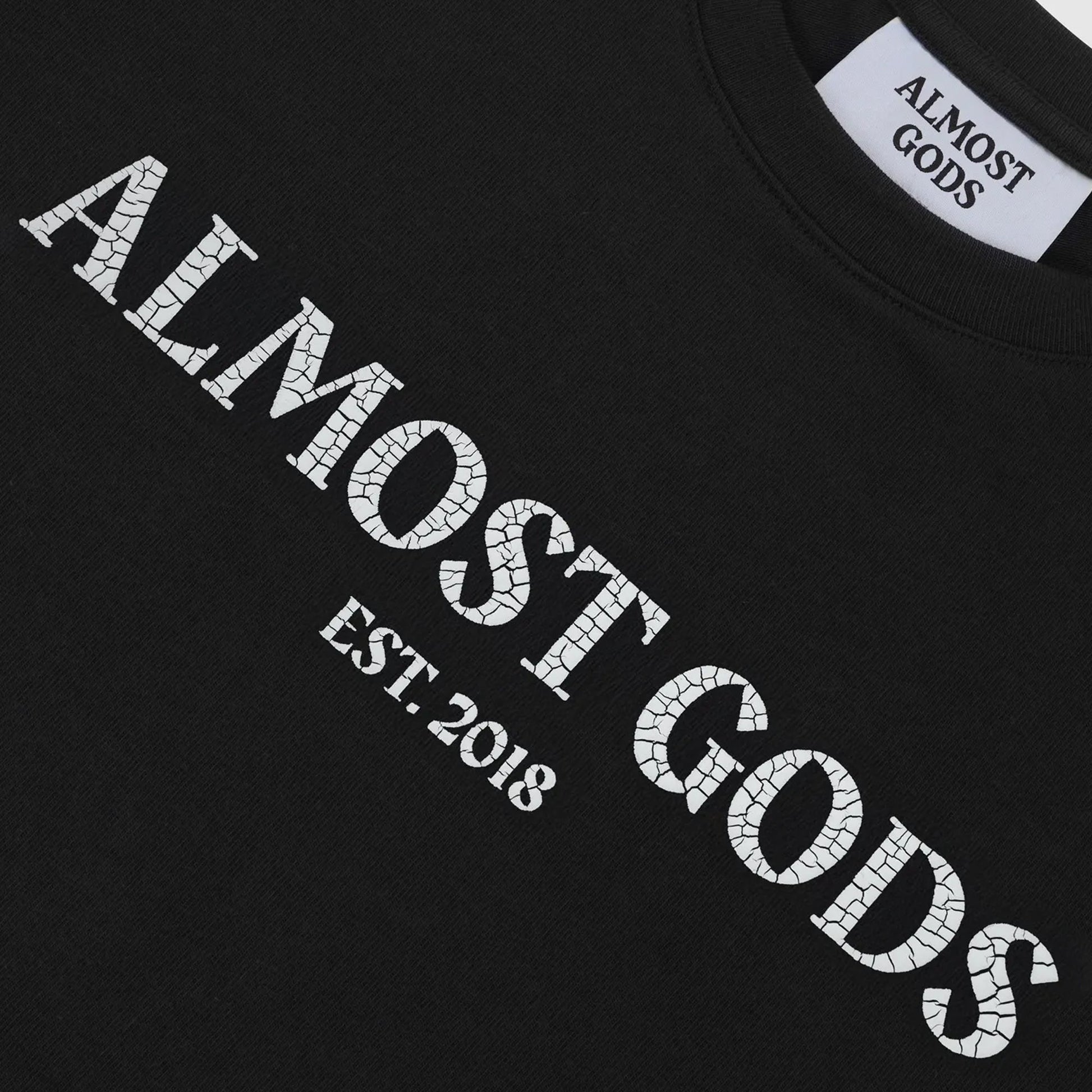 ALMOST GODS | CRACKED LOGO RELAXED TEE { BLACK