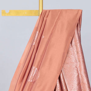 Borderless orange butter silk saree with zari buttas, contrast pallu of intricate designs in zari