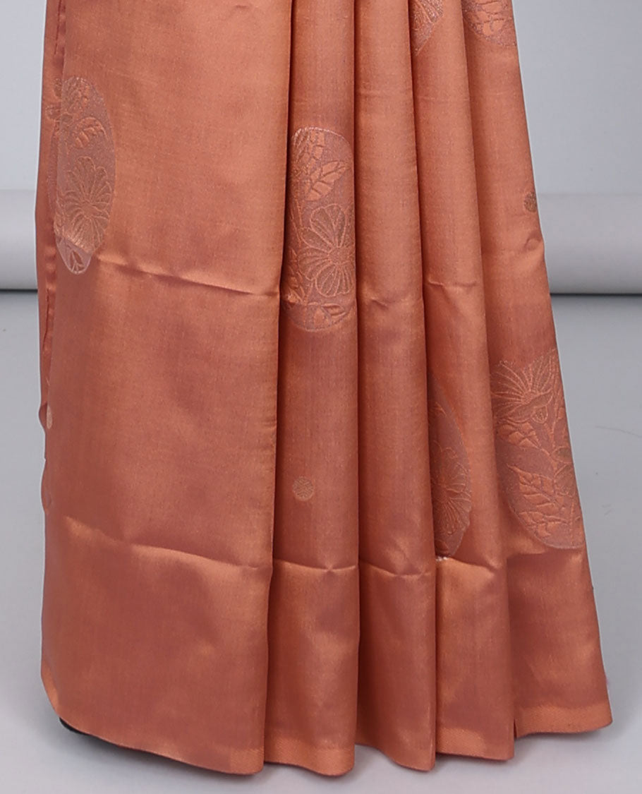Borderless orange butter silk saree with zari buttas, contrast pallu of intricate designs in zari