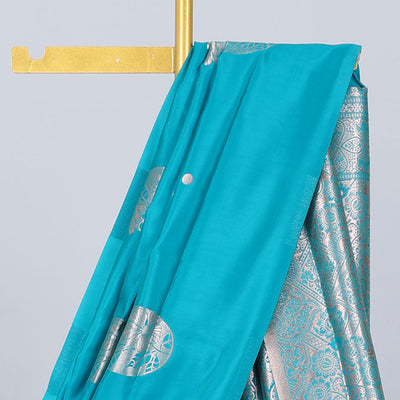 Borderless orange butter silk saree with zari buttas, contrast pallu of intricate designs in zari
