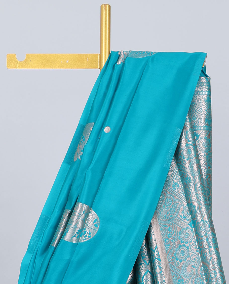 Borderless orange butter silk saree with zari buttas, contrast pallu of intricate designs in zari