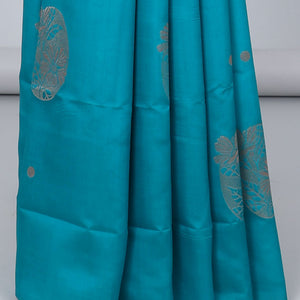 Borderless orange butter silk saree with zari buttas, contrast pallu of intricate designs in zari