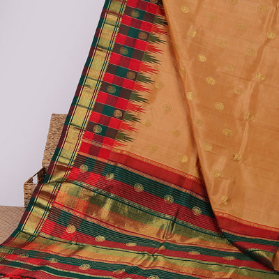 Orange buttas kancheepuram silksaree, contrast intricate zari pallu & checked temple border of thilakam mokku & banaras