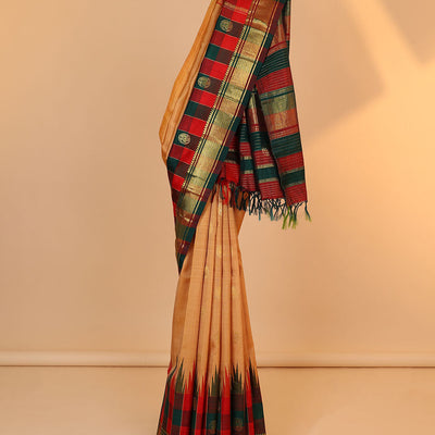 Orange buttas kancheepuram silksaree, contrast intricate zari pallu & checked temple border of thilakam mokku & banaras