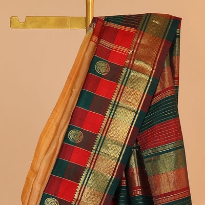 Orange buttas kancheepuram silksaree, contrast intricate zari pallu & checked temple border of thilakam mokku & banaras