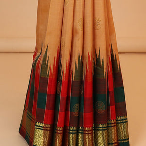 Orange buttas kancheepuram silksaree, contrast intricate zari pallu & checked temple border of thilakam mokku & banaras