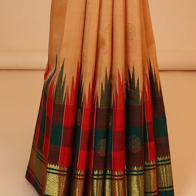 Orange buttas kancheepuram silksaree, contrast intricate zari pallu & checked temple border of thilakam mokku & banaras