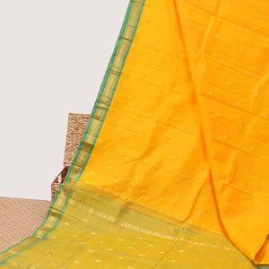 Orange zari buttas silk saree, contrast zari design pallu & zari border of rekku,banaras & mayil kann designs