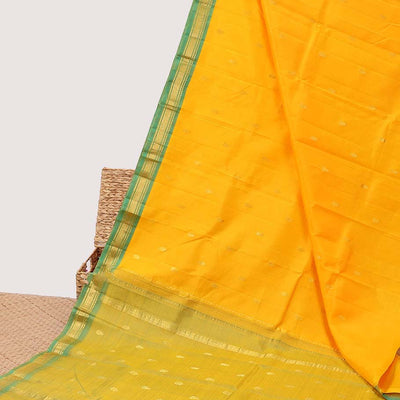 Orange zari buttas silk saree, contrast zari design pallu & zari border of rekku,banaras & mayil kann designs