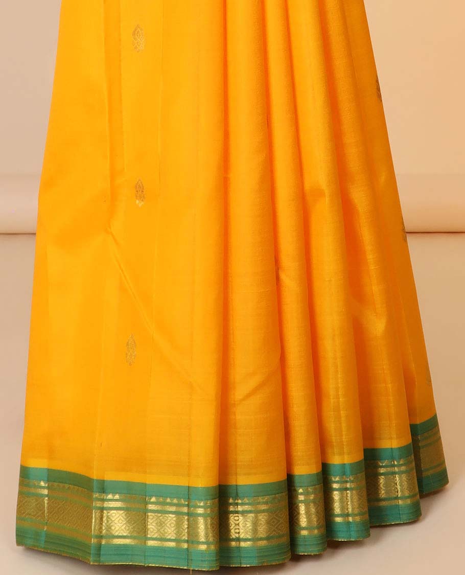 Orange zari buttas silk saree, contrast zari design pallu & zari border of rekku,banaras & mayil kann designs