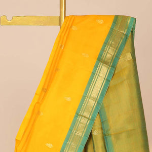 Orange zari buttas silk saree, contrast zari design pallu & zari border of rekku,banaras & mayil kann designs