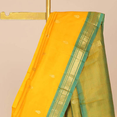 Orange zari buttas silk saree, contrast zari design pallu & zari border of rekku,banaras & mayil kann designs