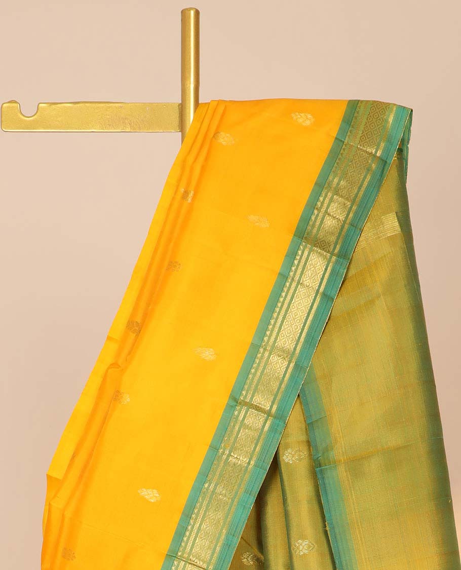 Orange zari buttas silk saree, contrast zari design pallu & zari border of rekku,banaras & mayil kann designs