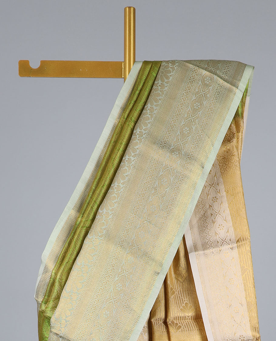 Green jacquard semi-banaras tissue saree, contrast traditional design zari border & pallu of intricate designs
