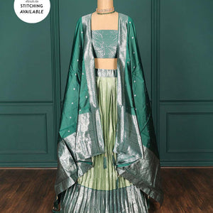 Green jacquard art-silk half-saree, contrast traditional zari design border, jacquard blouse & intricate dupatta