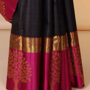 Purple zari striped silksaree, contrast floral jaal pallu & border of rekku,vanki,kodi visiry & tree designs